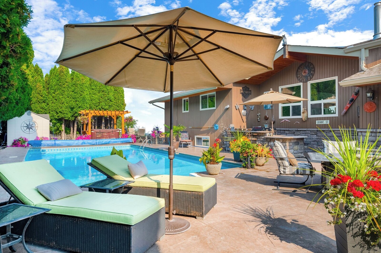 Private heated swimming pool with lounge chairs