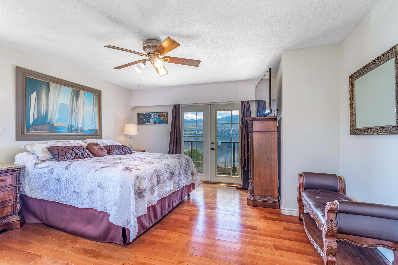 Master bedroom with king bed and en suite access